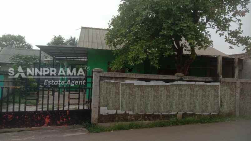 rumah pinggir jalan raya dengan tanah luas