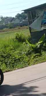 tanah pekarangan pinggir jl raya strategis