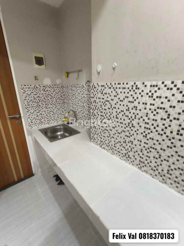 apartemen puncak dharmahusada studio tower b