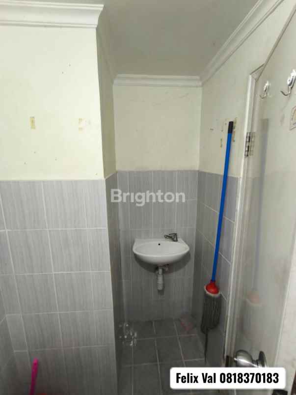 apartemen puncak dharmahusada studio tower b