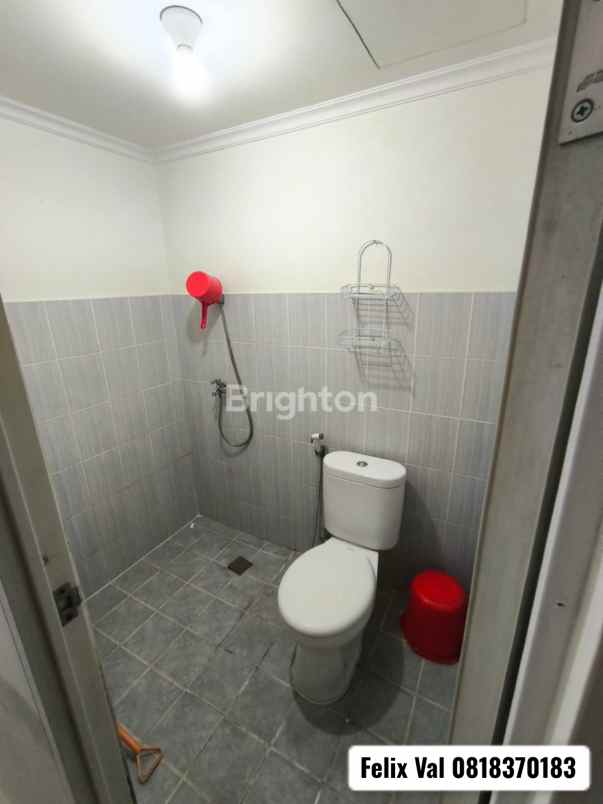 apartemen puncak dharmahusada studio tower b