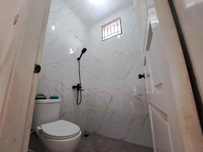 dijual rumah cluster harapan indah