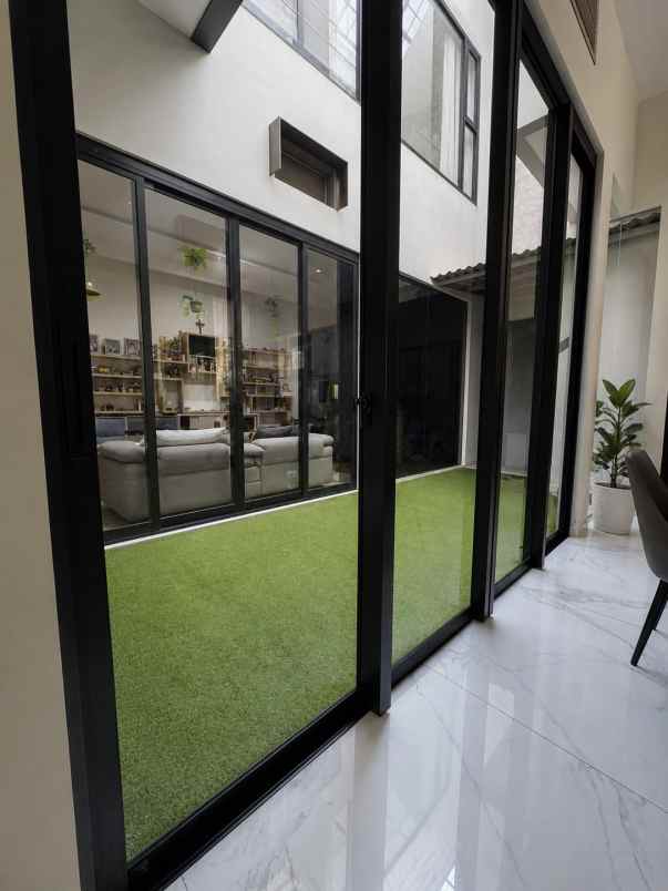 dijual rumah grand island pakuwon city