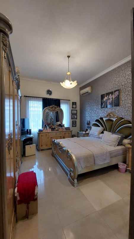 dijual rumah laguna regency kejawan