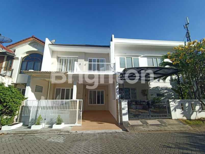 dijual rumah pakuwon city taman mutiara