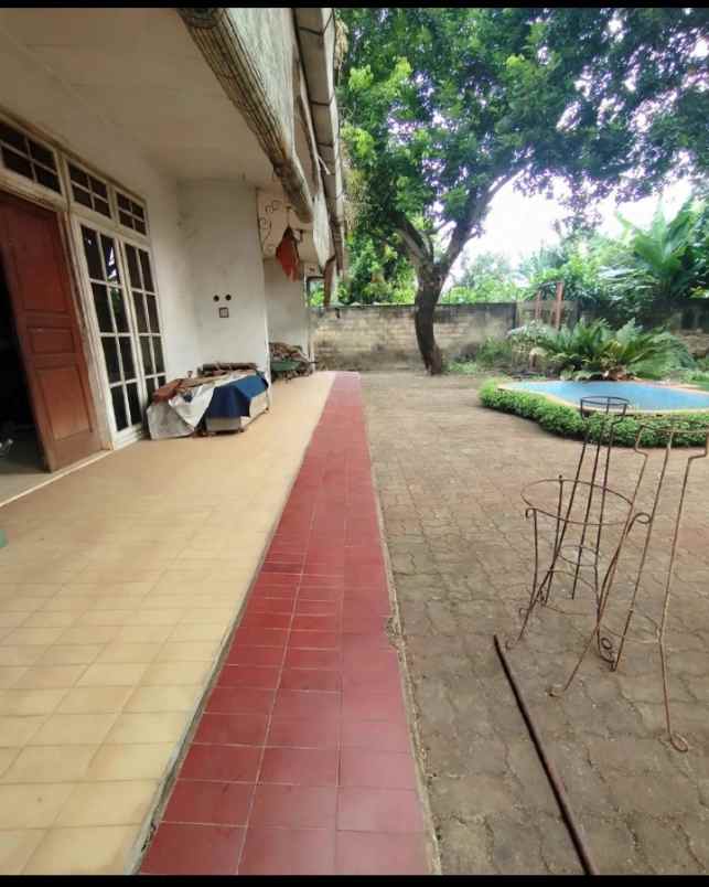 dijual rumah sisi jalan raya