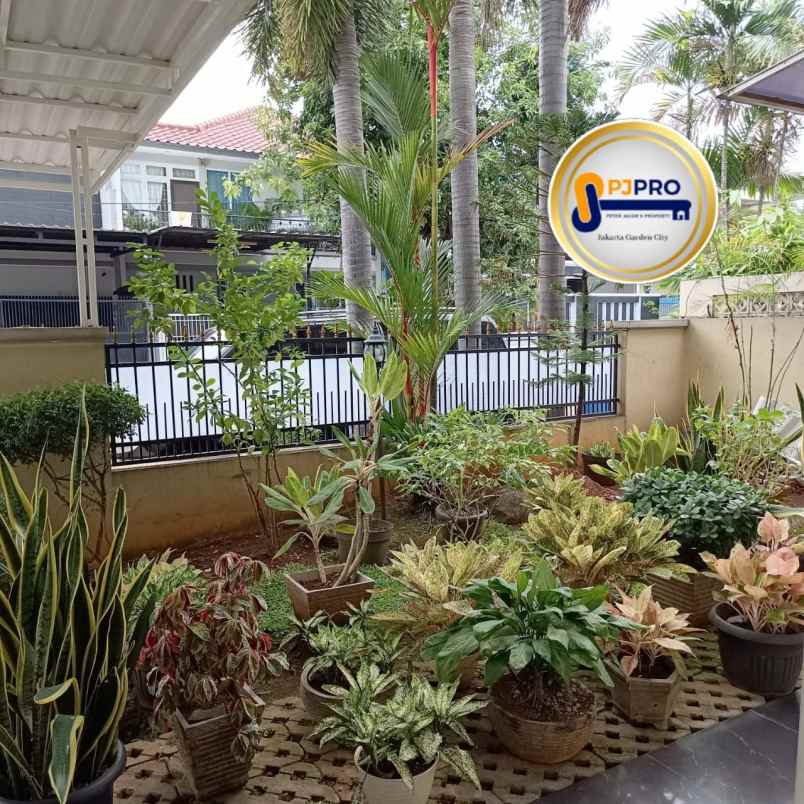 dijual rumah taman modern