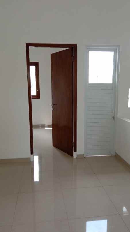 rumah jl mandor sanim 2 kukusan