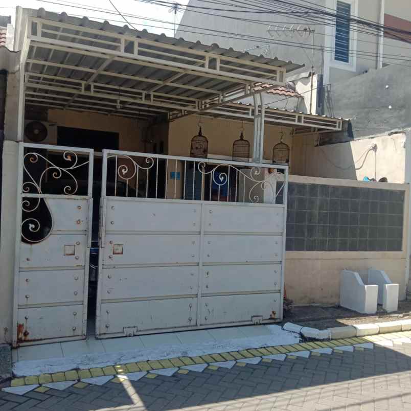 rumah jl taman wiguna selatan