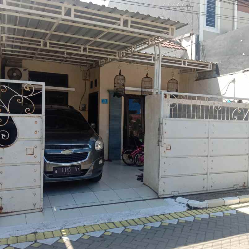 rumah jl taman wiguna selatan