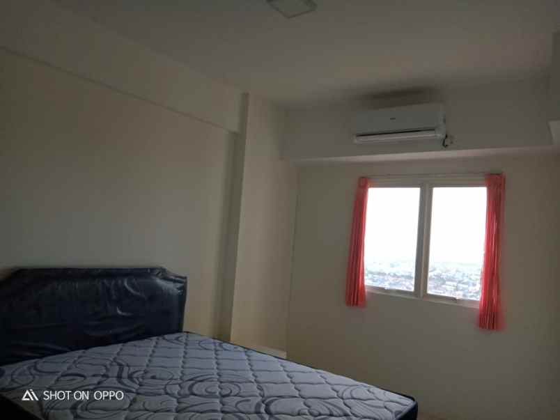 apartemen puncak dharmahusada tower a view suramadu