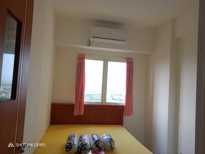 apartemen puncak dharmahusada tower a view suramadu