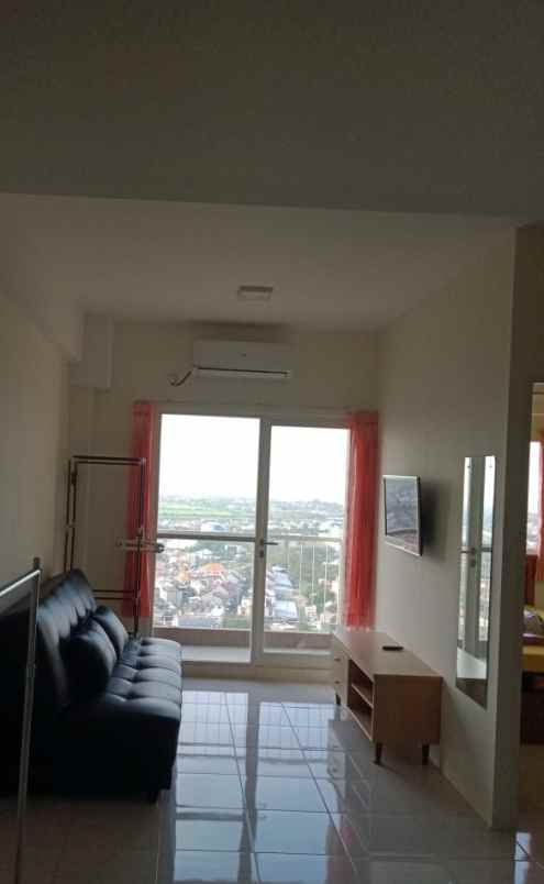 apartemen puncak dharmahusada tower a view suramadu