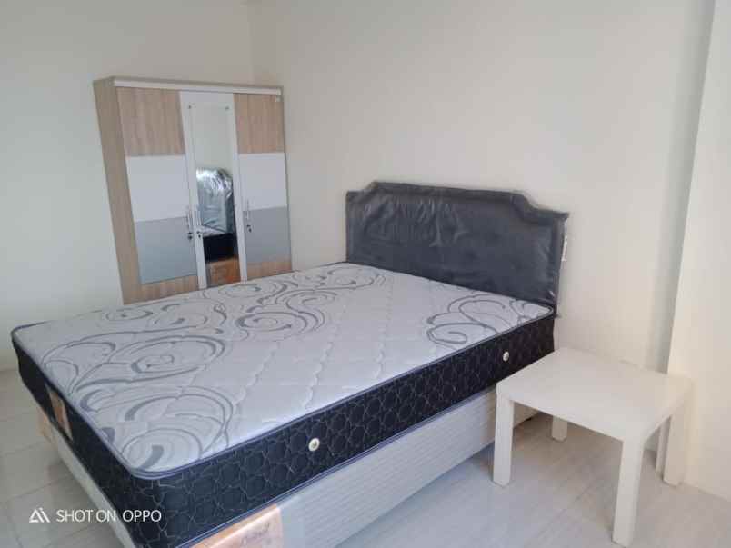 apartemen puncak dharmahusada tower a view suramadu