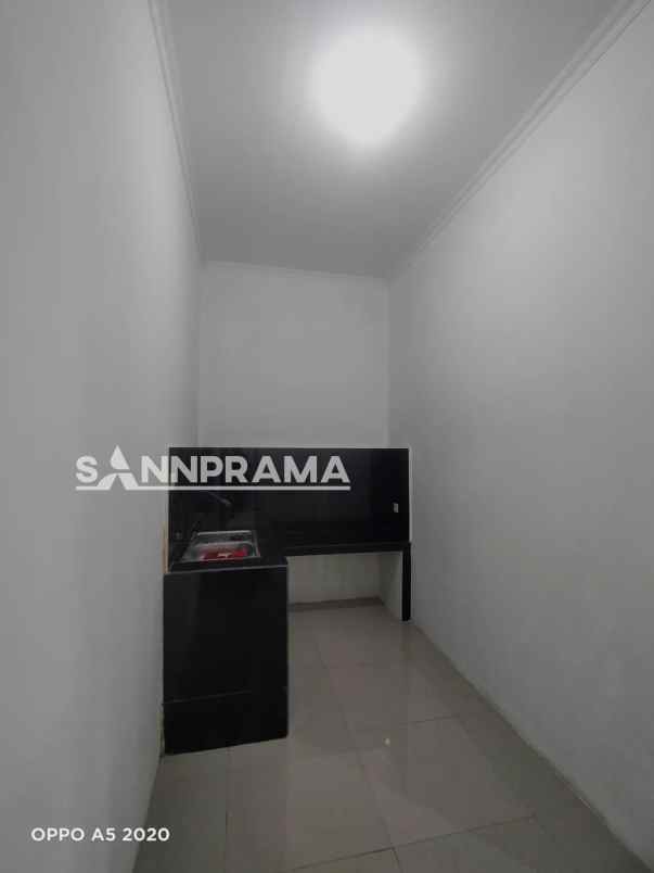 dijual rumah bumi sawangan indah