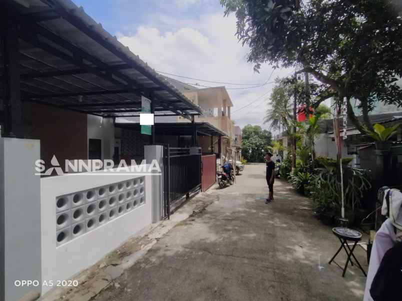 dijual rumah bumi sawangan indah