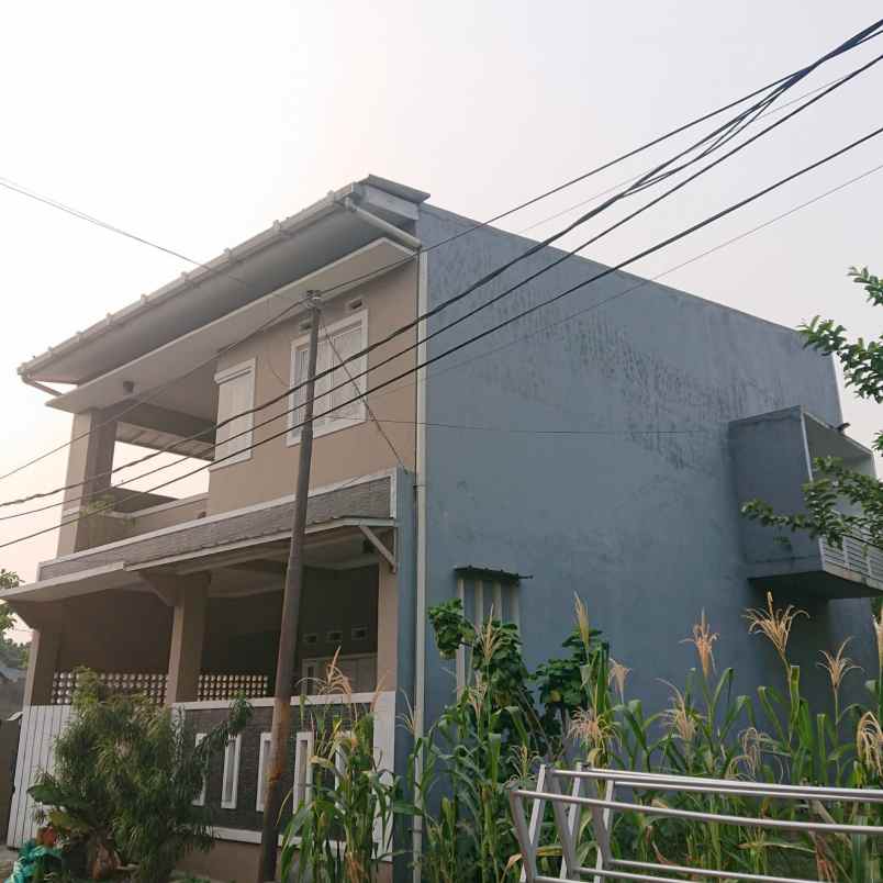 dijual rumah cluster kiwi graha raya