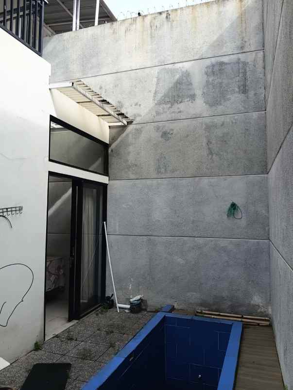 dijual rumah grand milenia regency