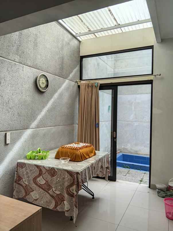 dijual rumah grand milenia regency