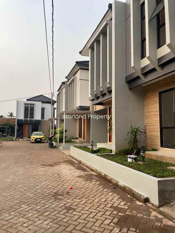 dijual rumah jalan raya larangan puri