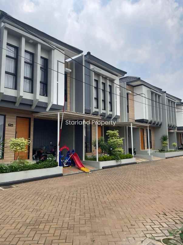 dijual rumah jalan raya larangan puri
