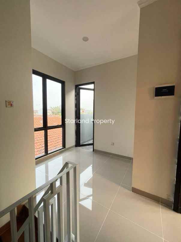 dijual rumah jalan raya larangan puri