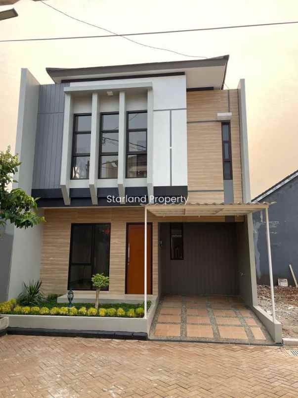 dijual rumah jalan raya larangan puri