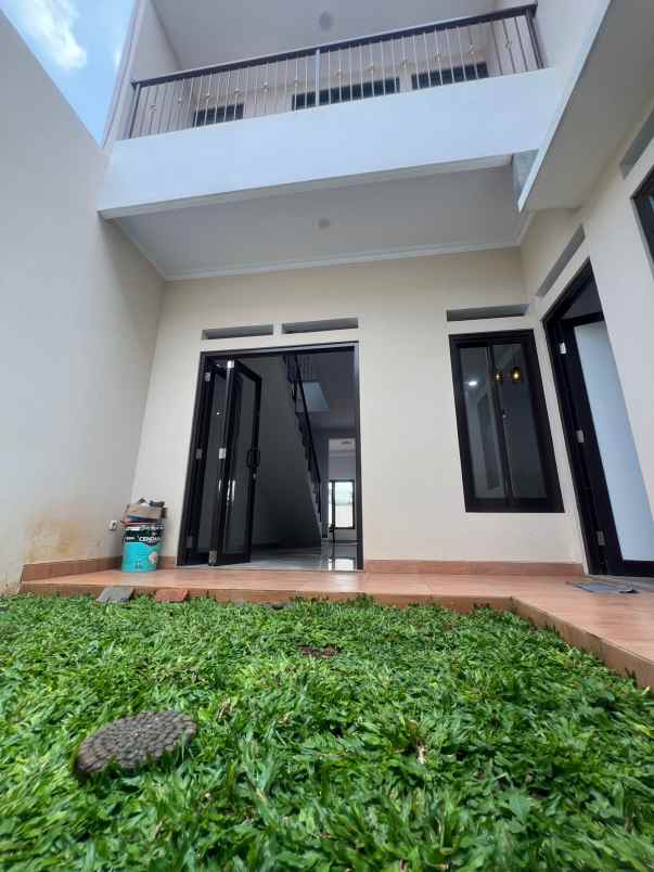 dijual rumah jl raya jatimekar