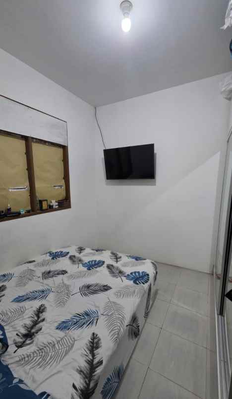 dijual rumah kayu putih