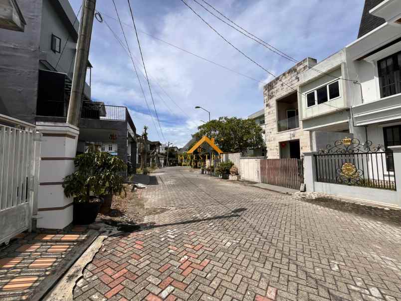 dijual rumah komplek graha metropolitan