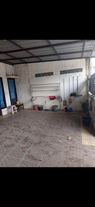 dijual rumah simprug di poris