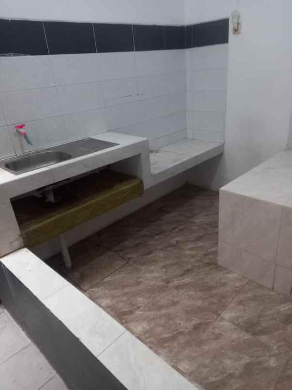 dijual rumah wiguna