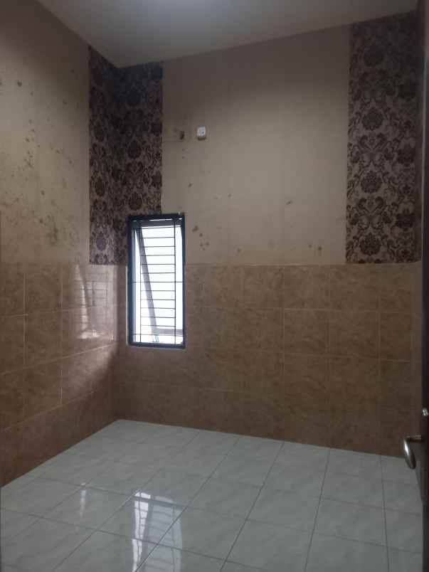 dijual rumah wiguna
