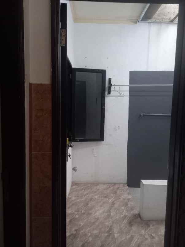 dijual rumah wiguna
