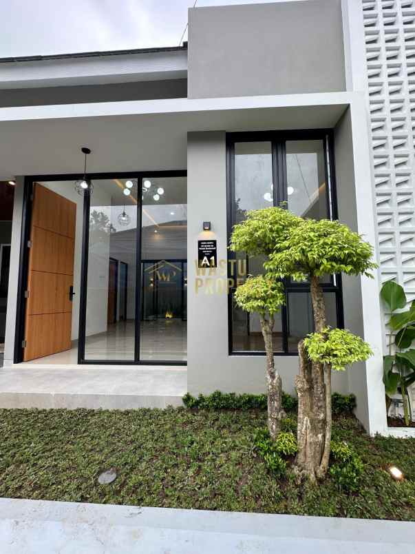 rumah modern dalam cluster di mlati sleman