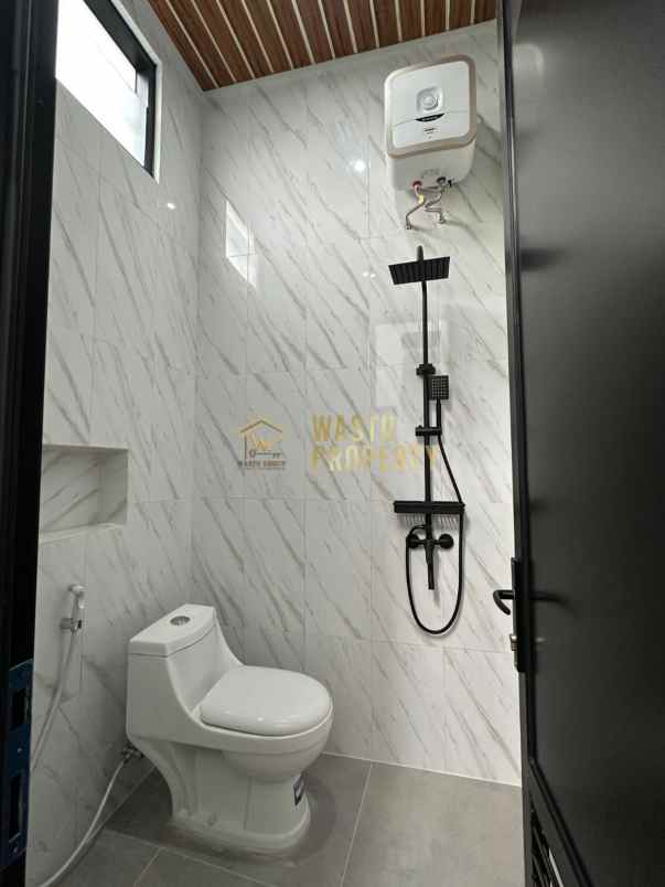 rumah modern dalam cluster di mlati sleman