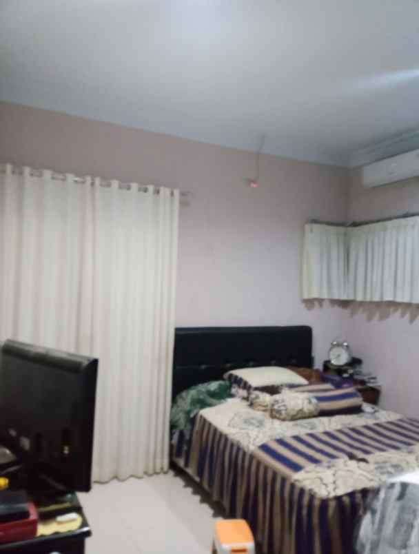 rumah second 2 pantai terawat di harjamukti depok