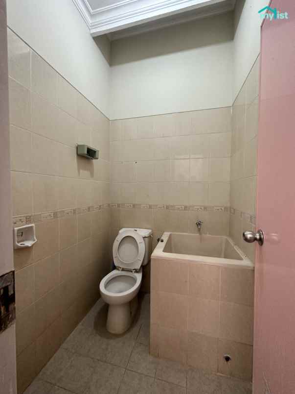 rumah siap huni dalam cluster purimas kosongan terawat