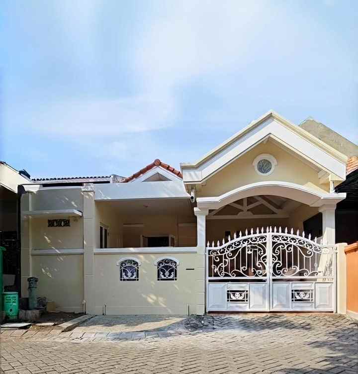 dijual rumah perum puri surya jaya
