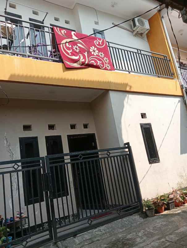 rumah 2 lantai murah 200 juta nego