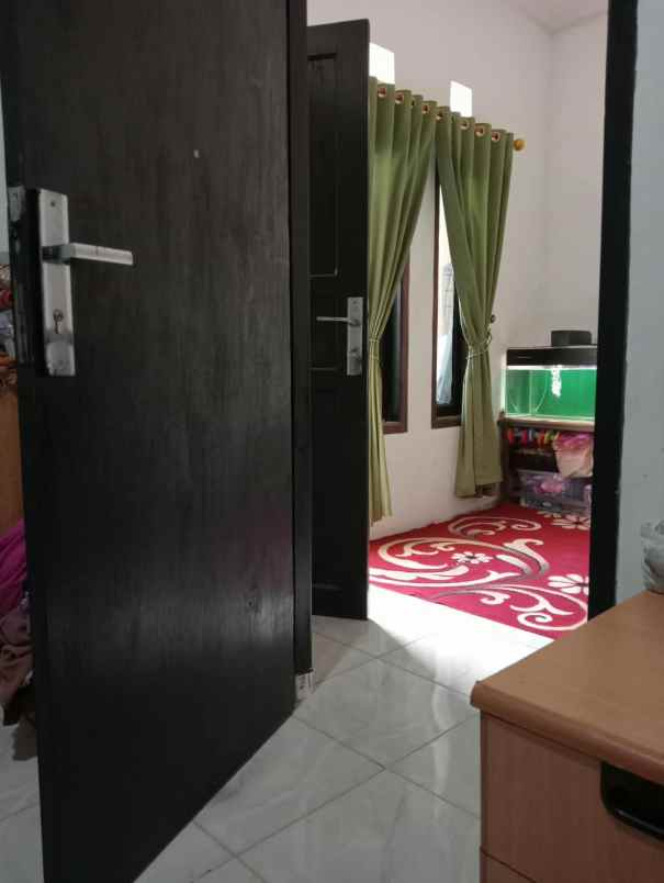 rumah 2 lantai murah 200 juta nego