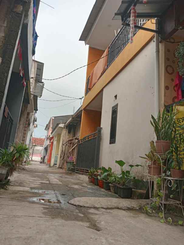 rumah 2 lantai murah 200 juta nego