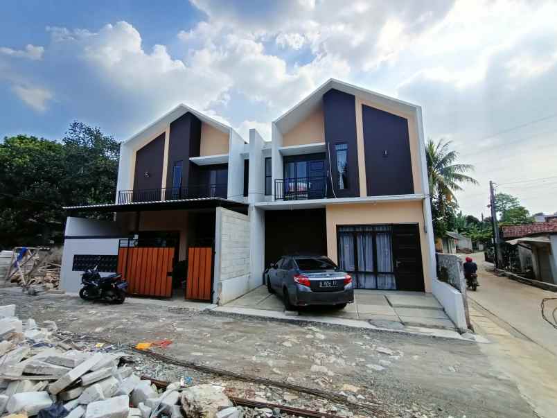 rumah kpr 2 lantai dekat exit tol dan stasiun