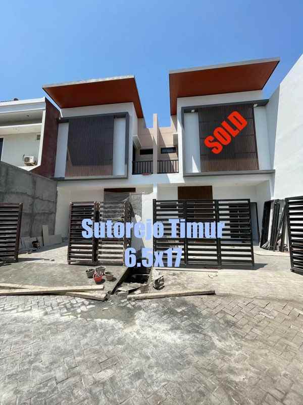 rumah minimalis tropical sutorejo indah surabaya timur