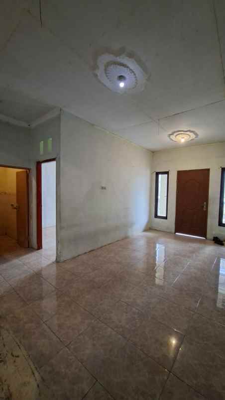dijual rumah bumi sawangan indah