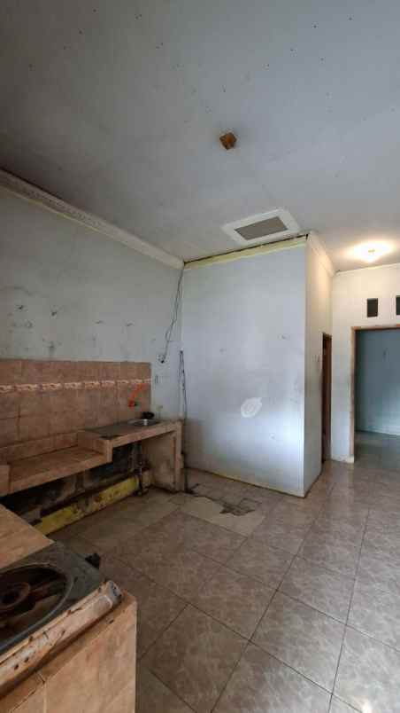 dijual rumah bumi sawangan indah