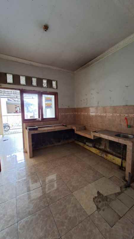 dijual rumah bumi sawangan indah