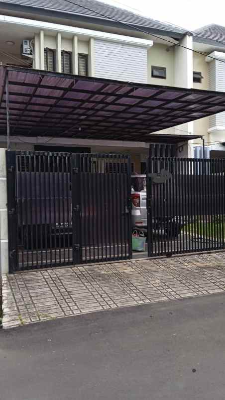 dijual rumah jl pondok kelapa raya