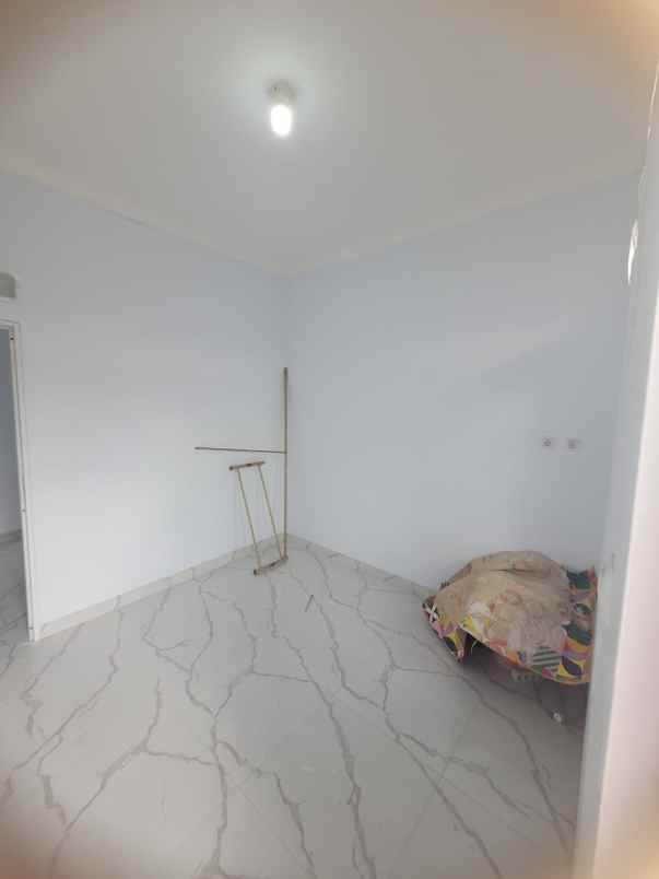 disewakan rumah jl melati kelapa dua wetan