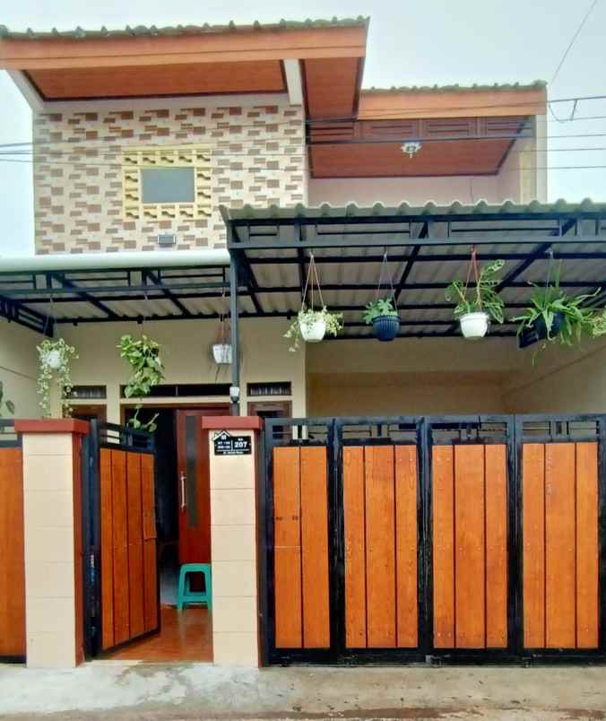 dijual butuh murah rumah 2 lantai di sukmajaya depok